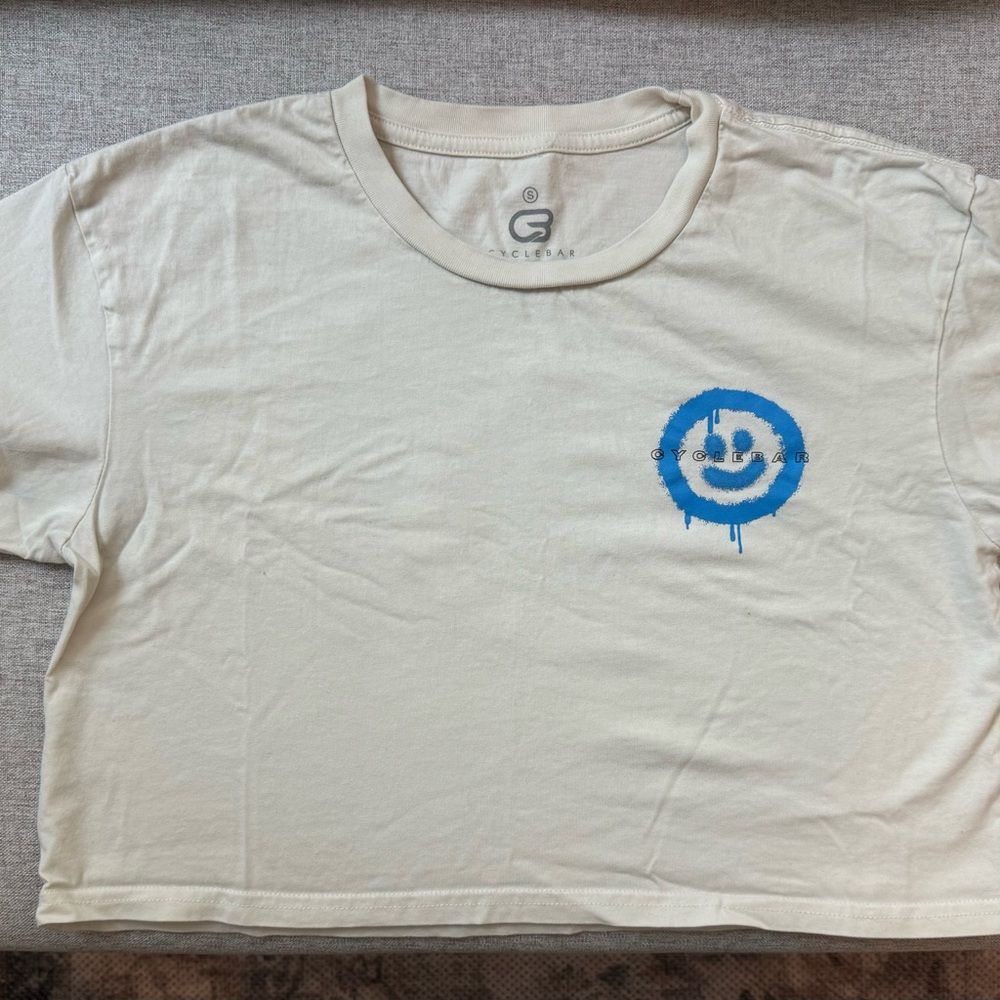 Cream Crop Top with Blue Smiley Graphic